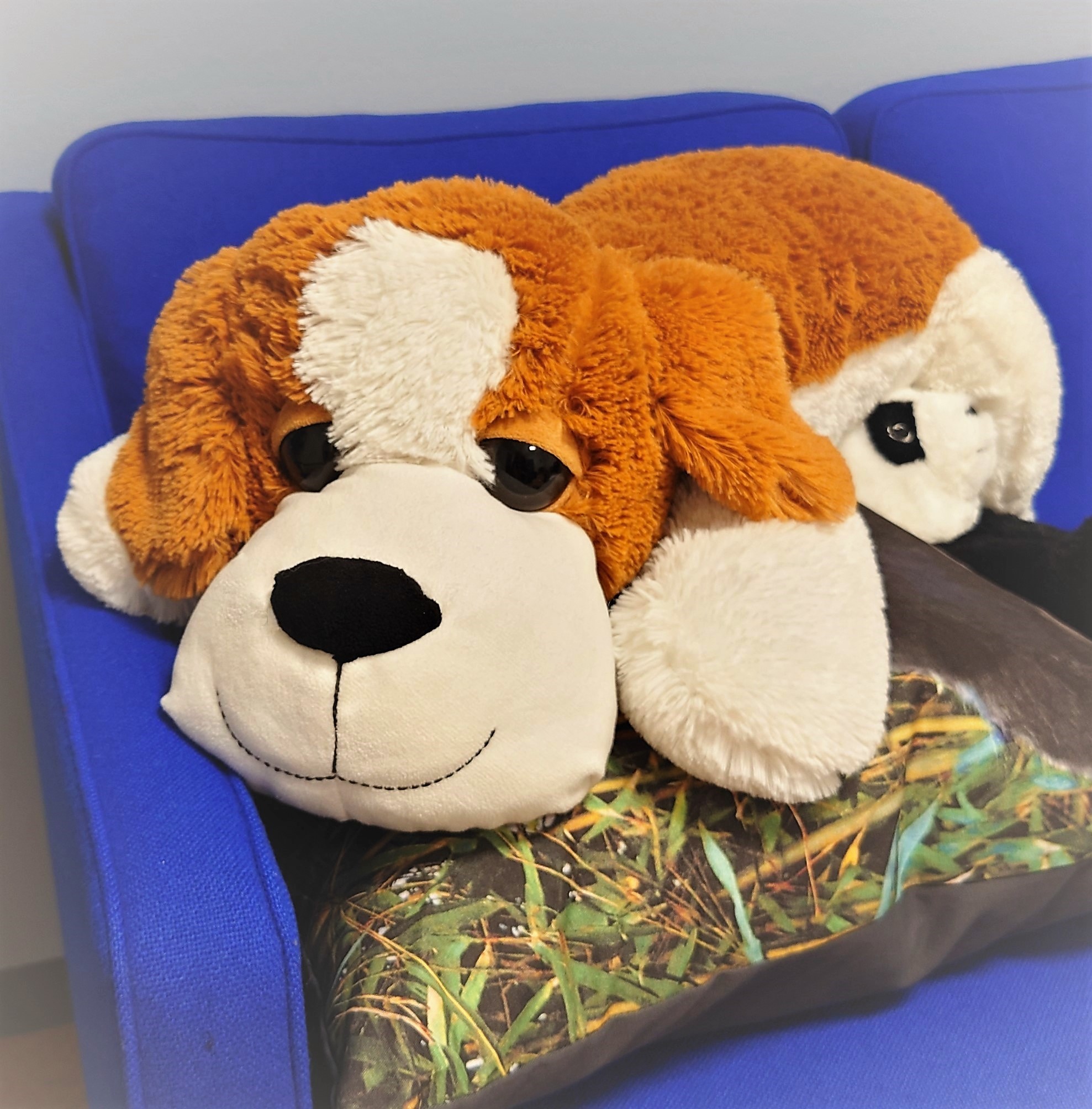 Dekorativt billede af et tøjdyr (hund med hængeøre)